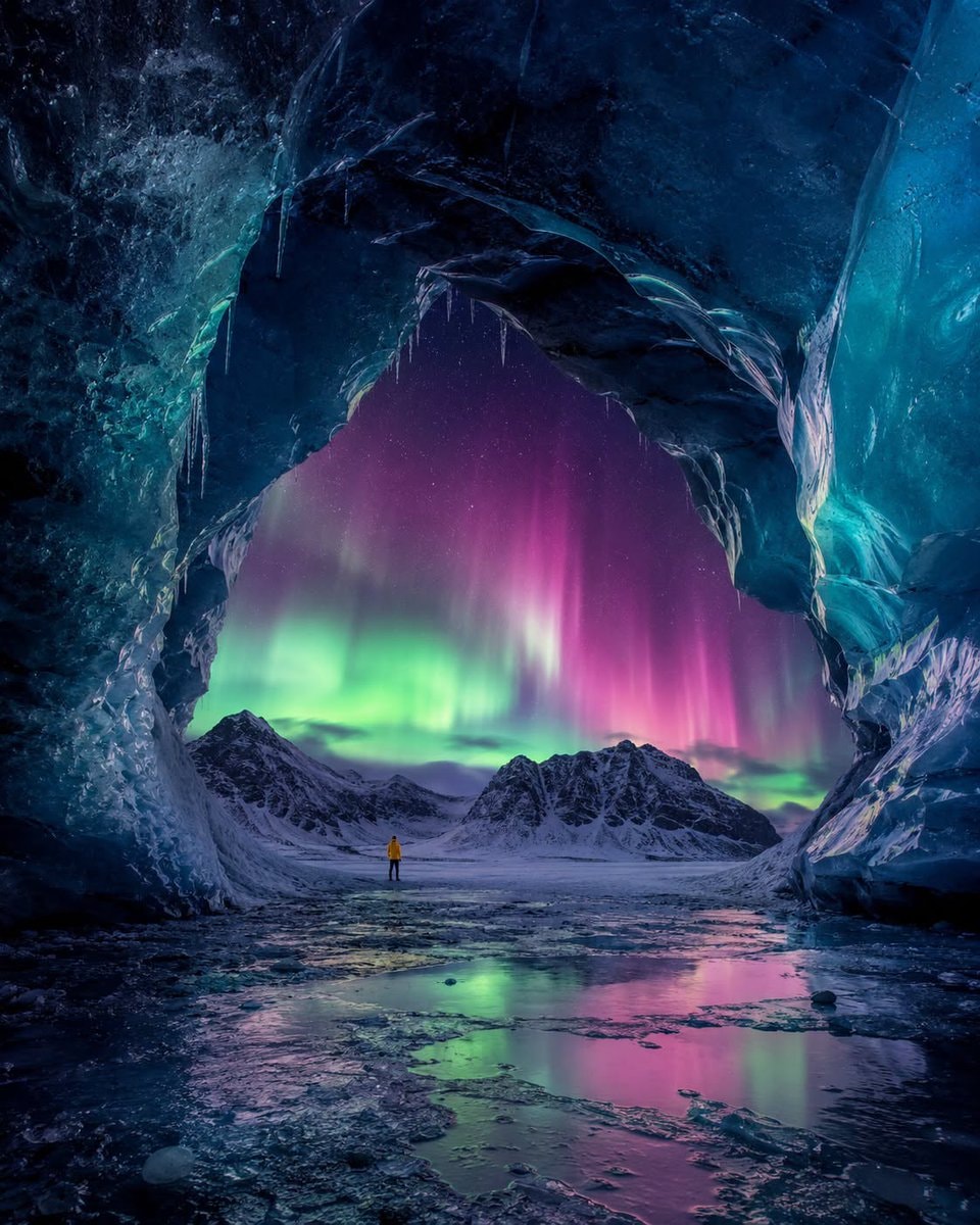 Aurora borealis from a blue ice cave