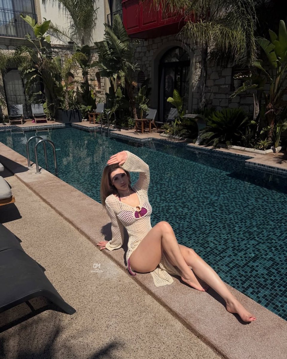 Su Balcı poolside blonde