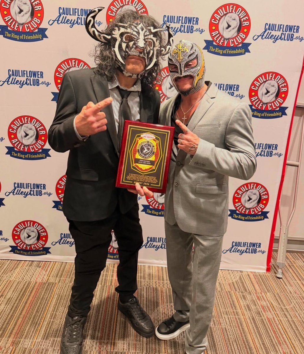 Rey Mysterio and Psychosis award moment Rey Mysterio and Psychosis award moment