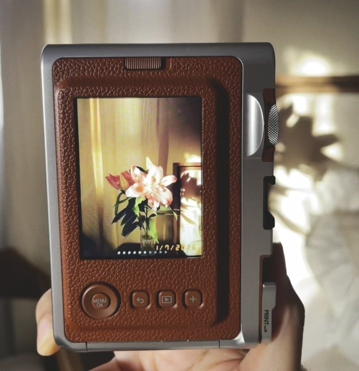 pink lilies photo on vintage camera
