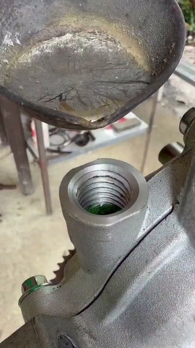 Filling a metal part with green liquid