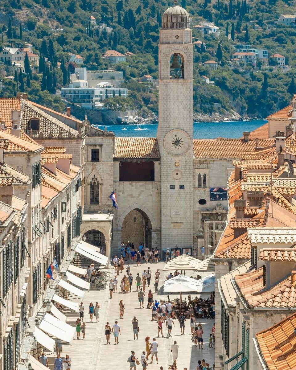 Mediterranean town square with clock tower (photo 1 of 4)