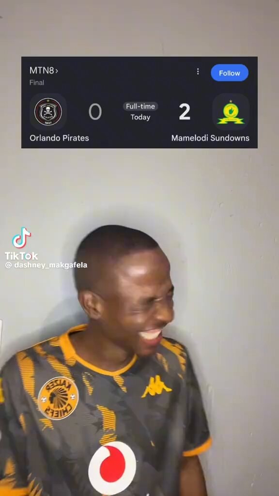 Young man laughing heartily
