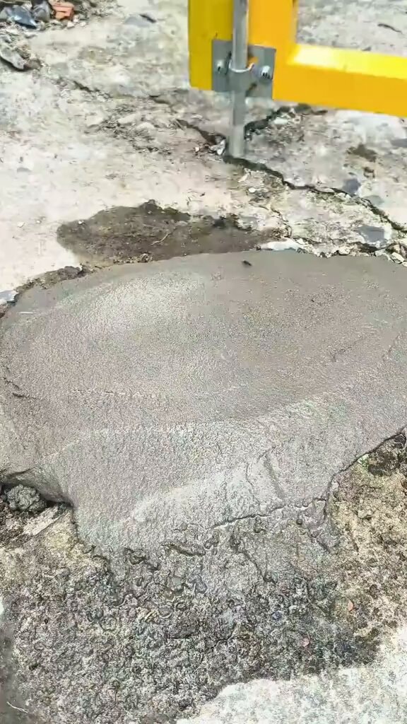 jackhammer breaking concrete