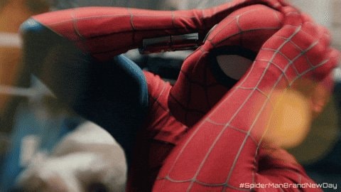 Spider-Man adjusting mask GIF