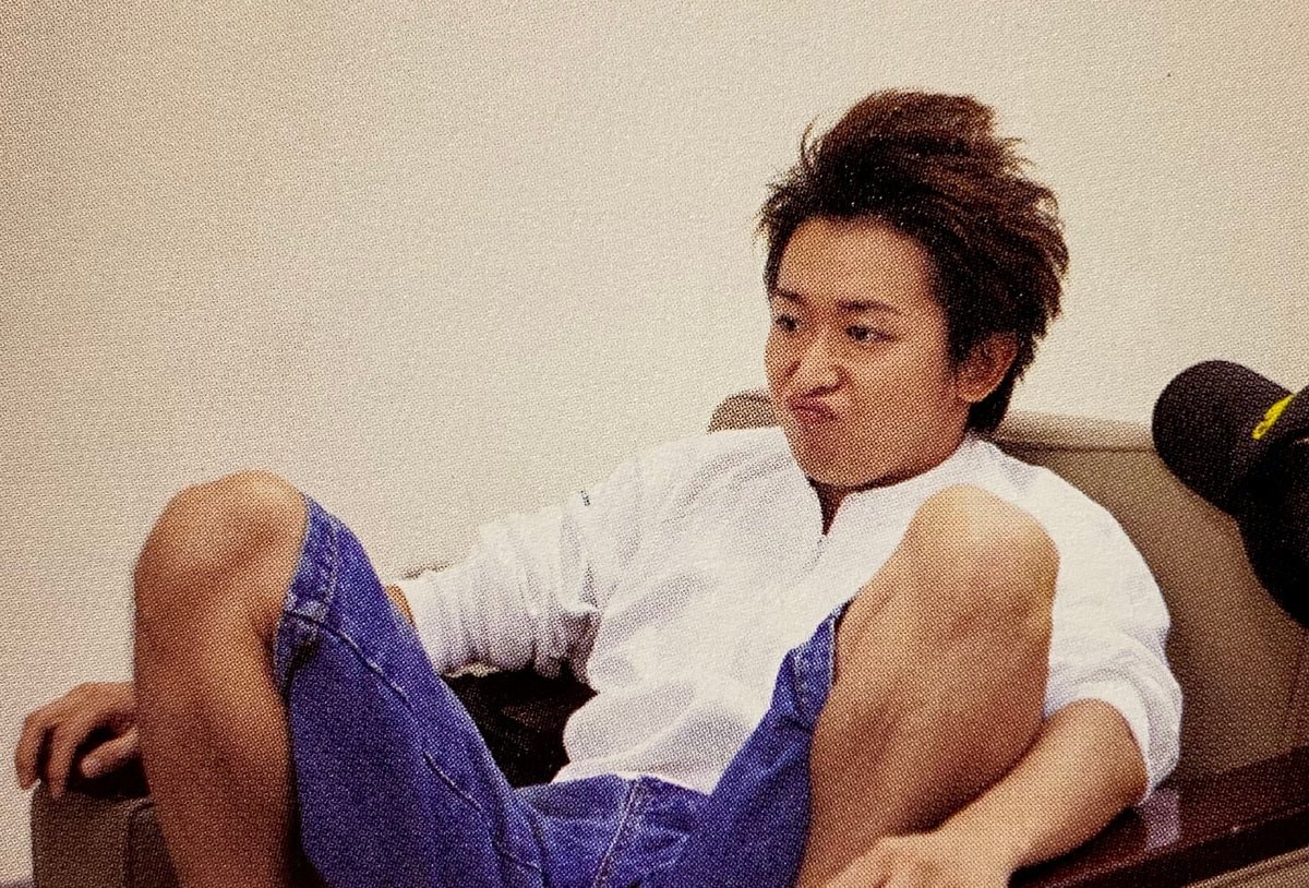 Arashi sitting relaxed in chair (photo 2 of 3)