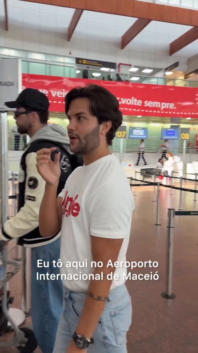airport friend teasing the rich guy