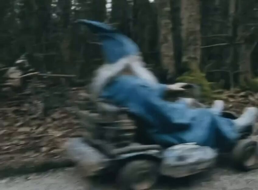 gnome in makeshift vehicle