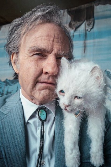 Tom Cruise holding white cat Tom Cruise holding white cat