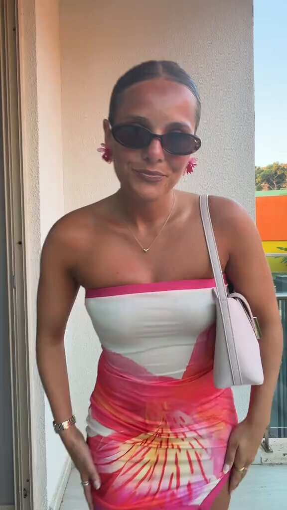 Olivia Buzaglo floral dress moment