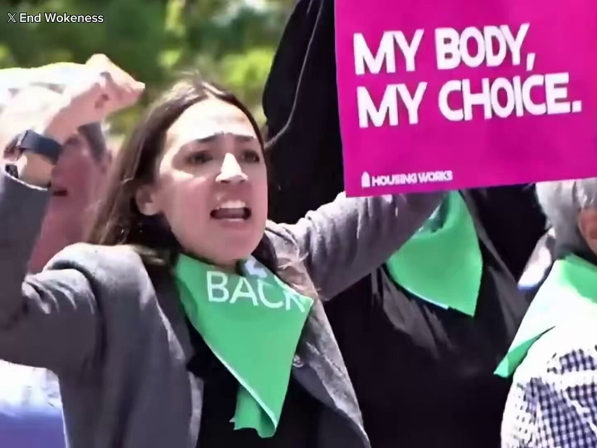 Feminist protest with MY BODY MY CHOICE sign