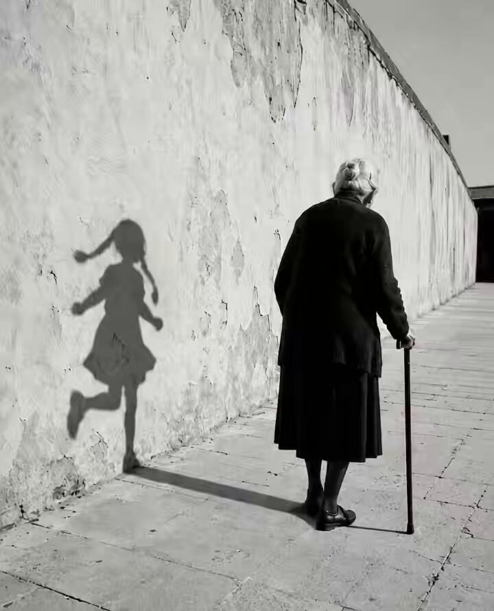 elderly woman shadow reflection