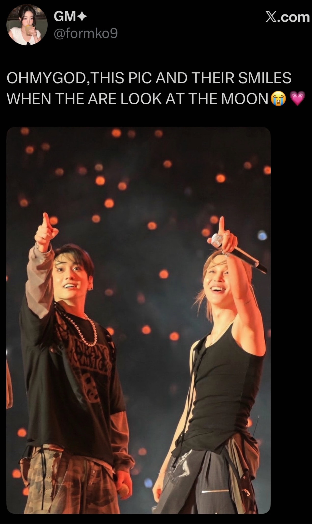 Jikook pointing at the moon
