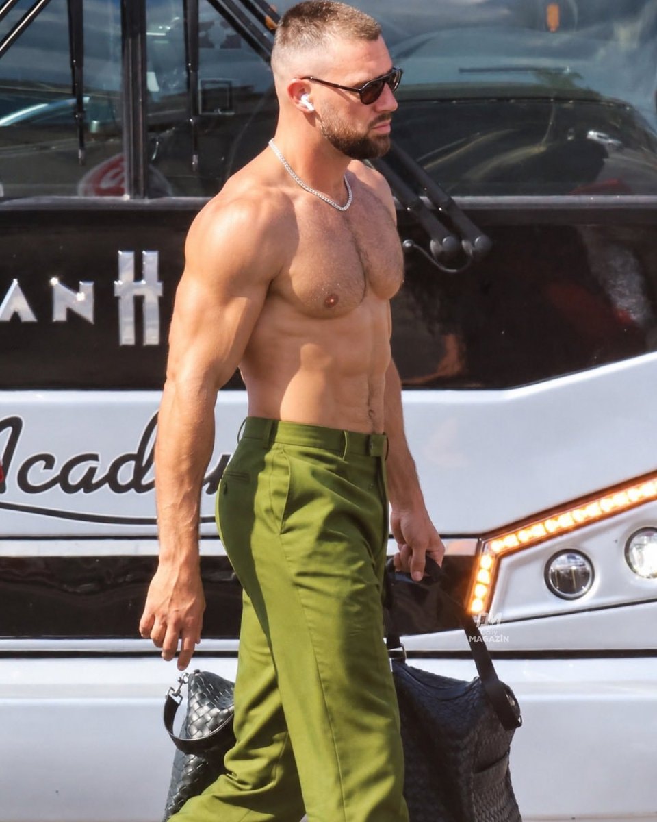 Travis Kelce shirtless in green pants (photo 2 of 2)