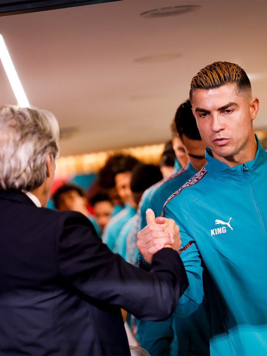 Cristiano Ronaldo shakes hands before match