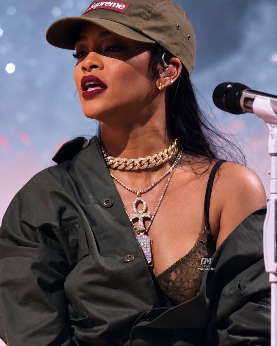 Rihanna singing into a microphone