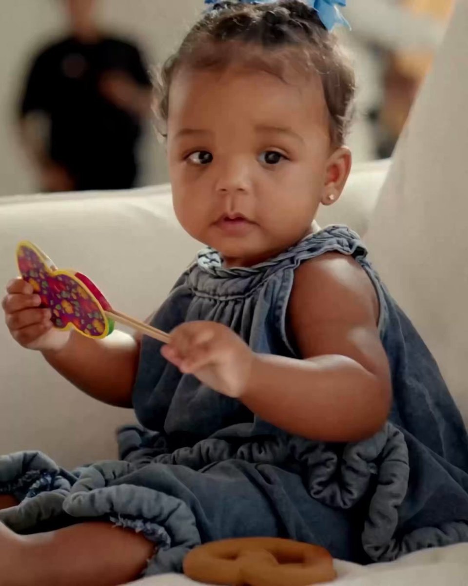 baby with butterfly toy
