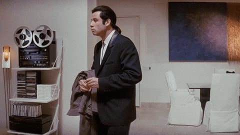 Man in suit pondering reaction videos