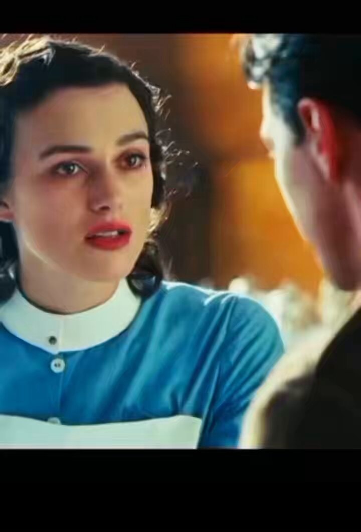 Woman in blue dress dramatic moment