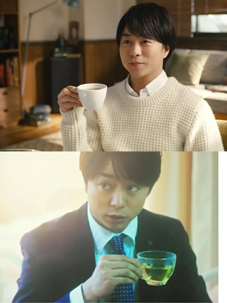 Man in suit with teacup (photo 3 of 4)
