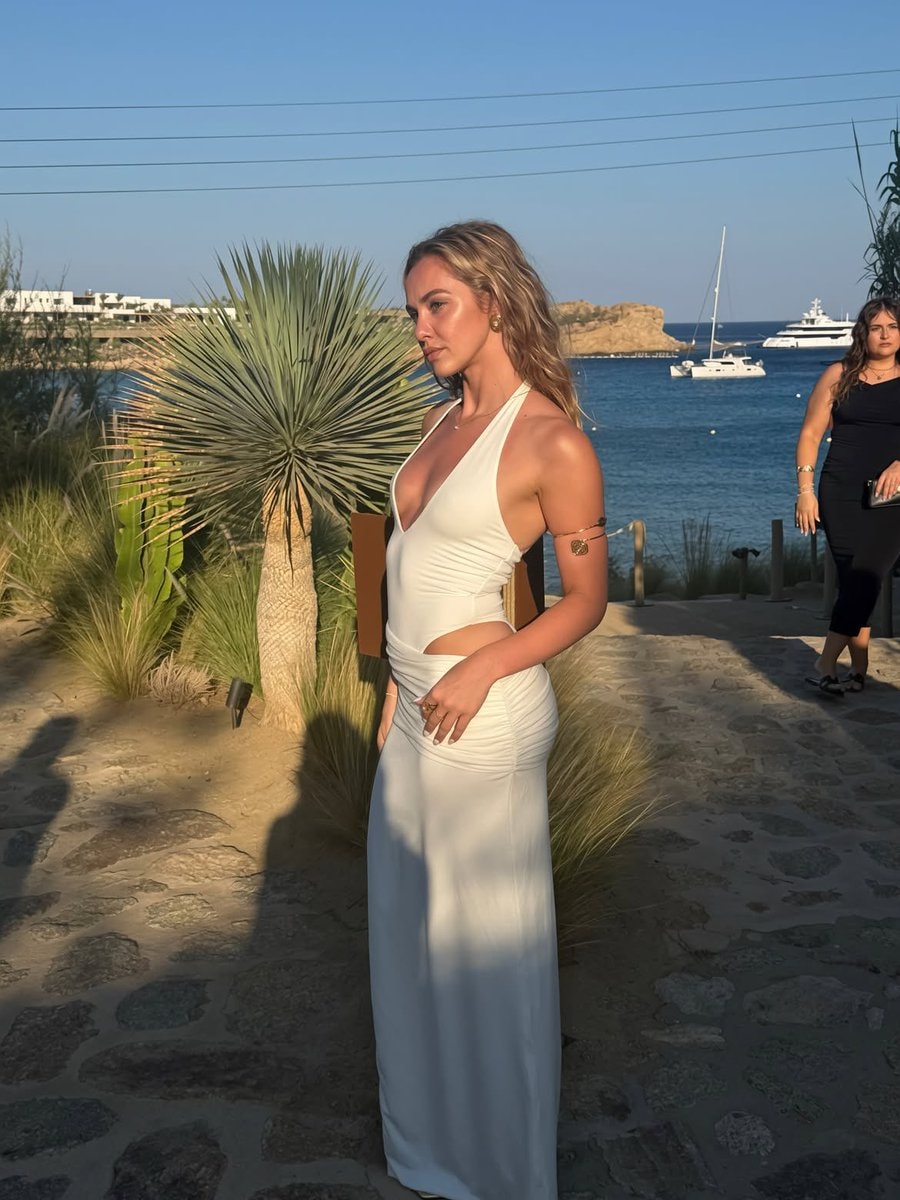 Mollie Winnard in white cut-out dress (photo 4 of 4)