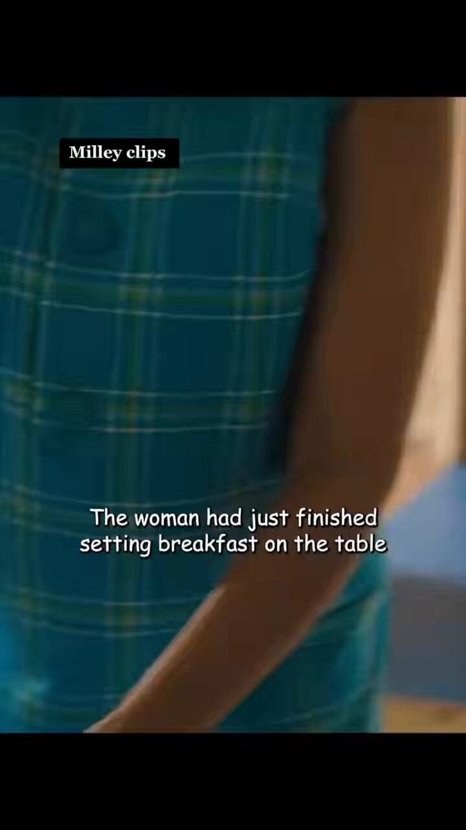 Woman setting breakfast on table