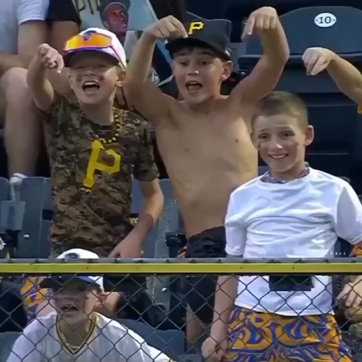 Friends cheering at sporting event