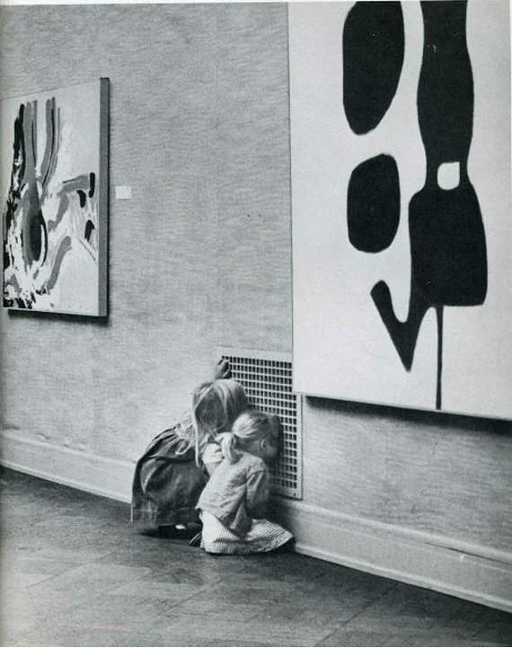 Girls captivated by grate at SFMOMA 1963