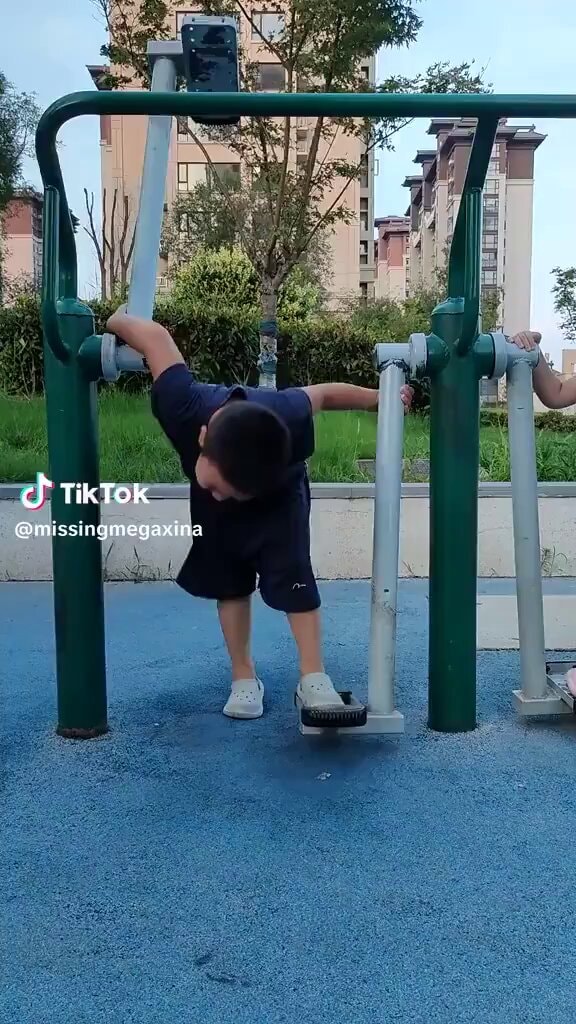 kid at outdoor gym