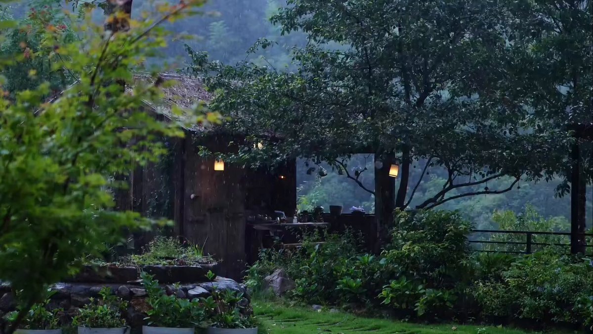 rustic wooden structure in greenery