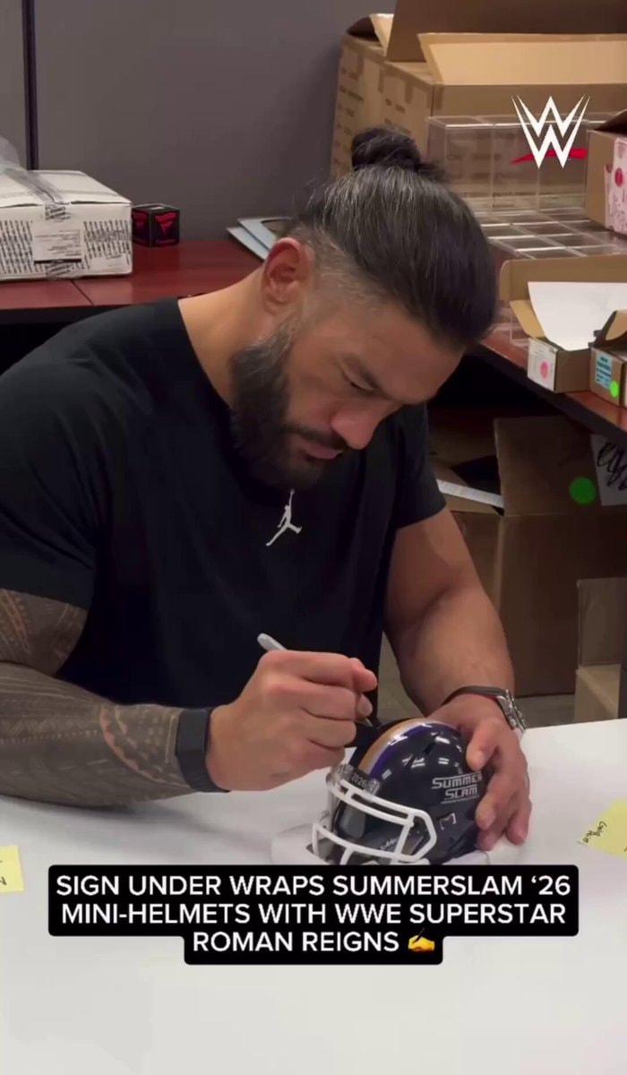 Roman Reigns mini SummerSlam helmets signing