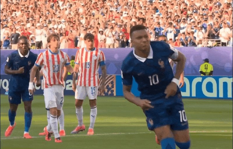 Mbappé in action blue uniform