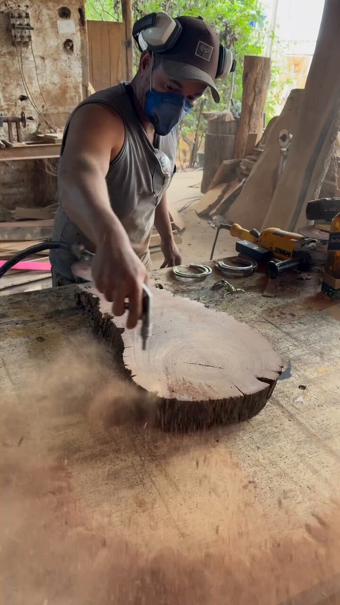 woodworker finishing a slab