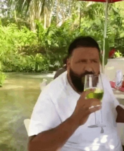dj khaled drinking a beverage
