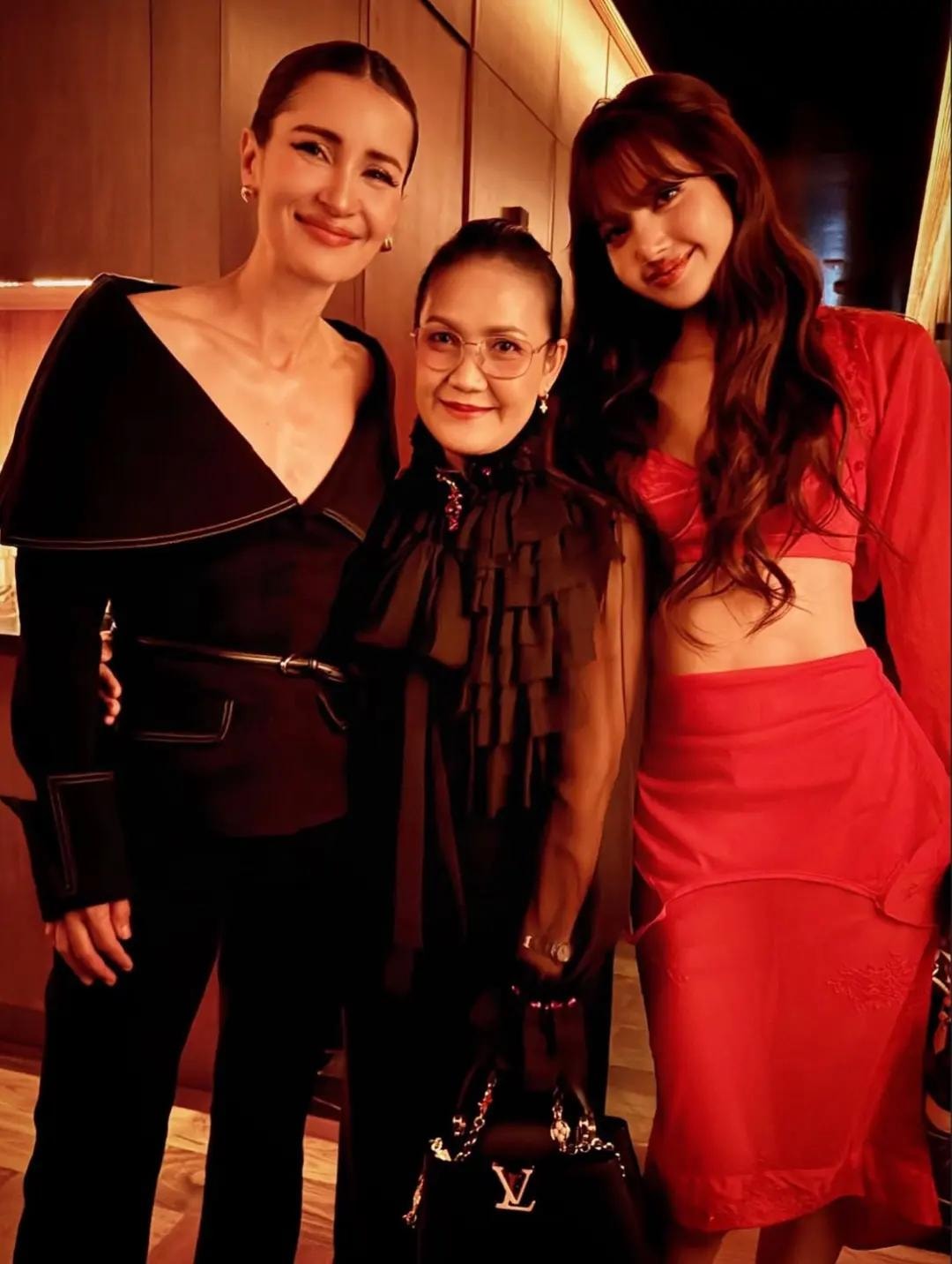 Anne Thongprasom with Lisa at ULTIMUNE after-party (photo 2 of 4)