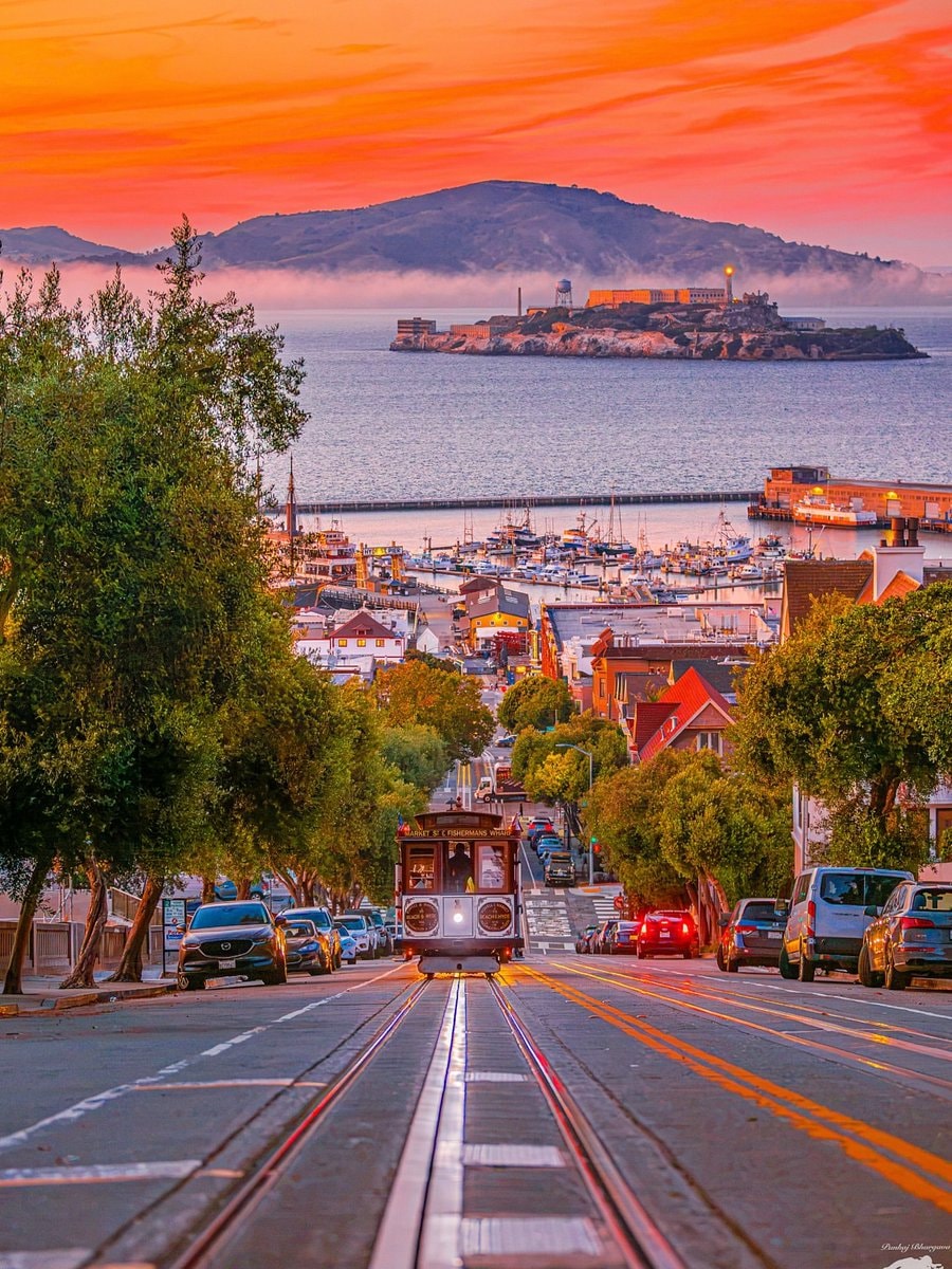 San Francisco cable car sunset with Alcatraz