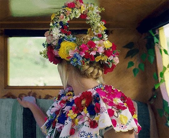Floral crown and dress in rustic window