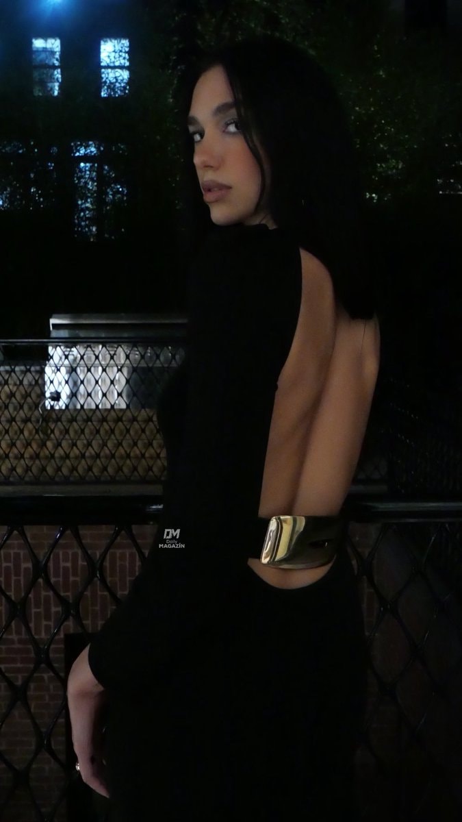 Dua Lipa stylish black dress (photo 2 of 2)