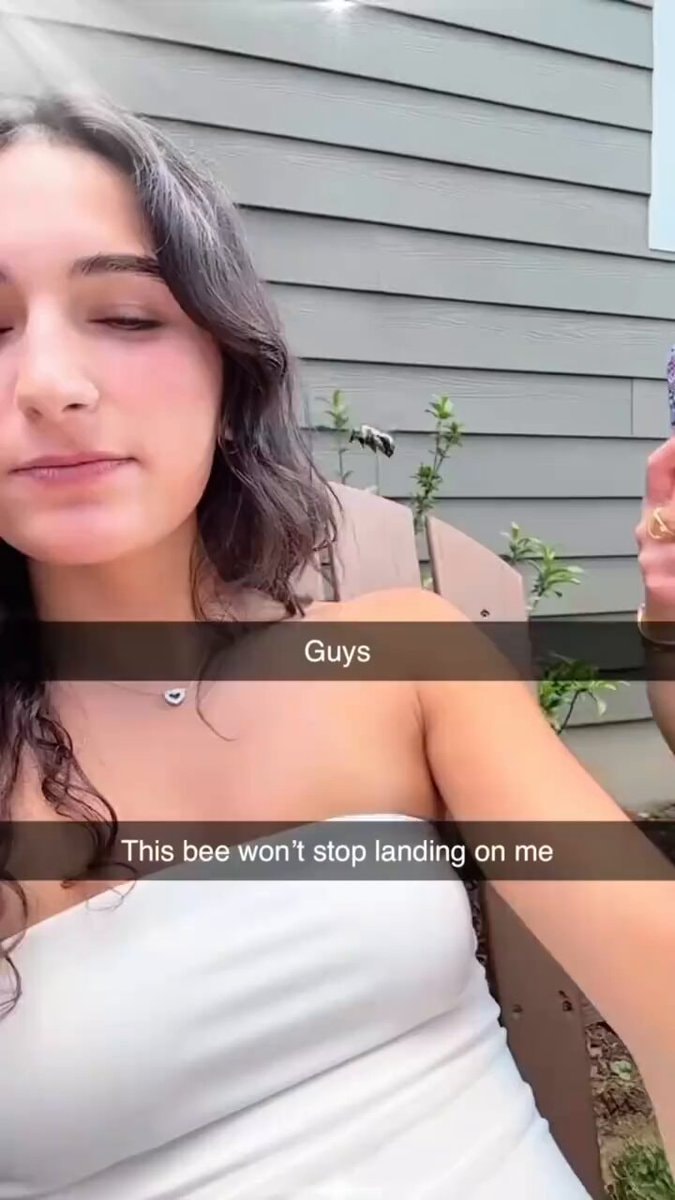 Bee won't stop landing on her