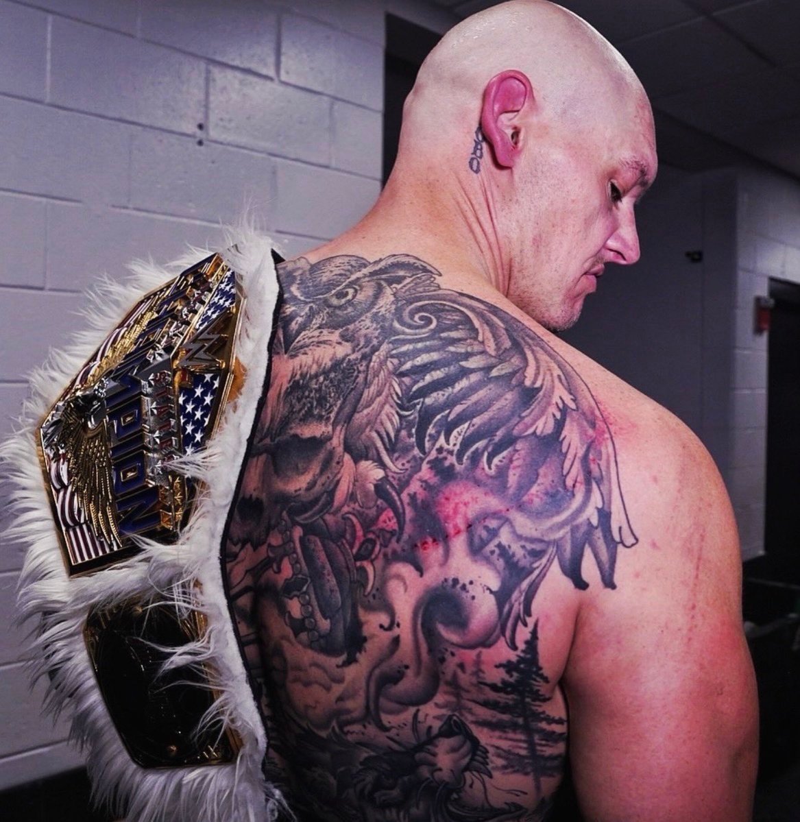 Baron Corbin kendo stick battle wounds
