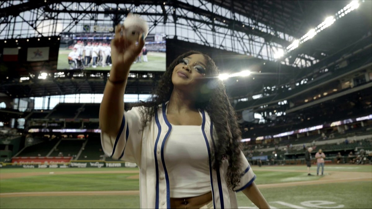 Maya World throws first pitch