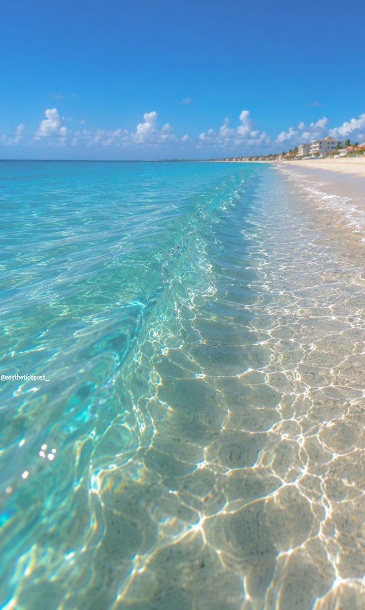crystal clear ocean wave (photo 2 of 2)