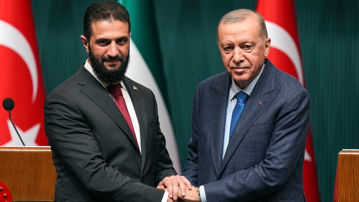 Turkey Syria energy deal handshake