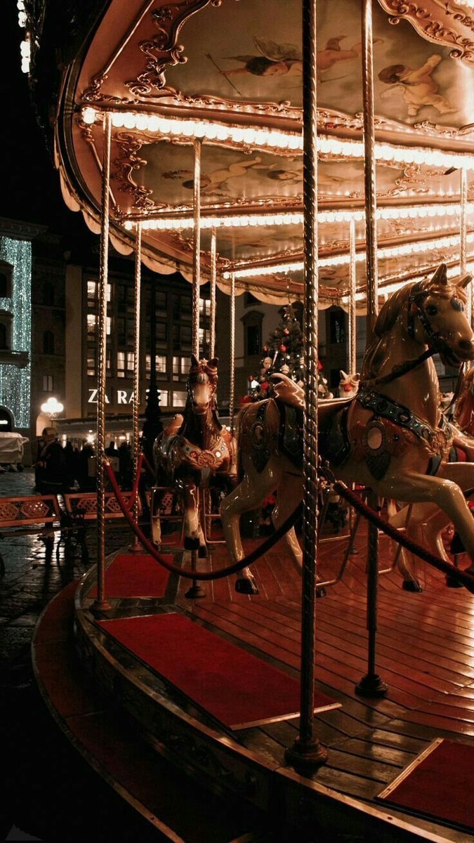 Amusement park swing ride at twilight (photo 2 of 2)