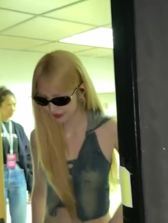 Blonde denim vest doorway