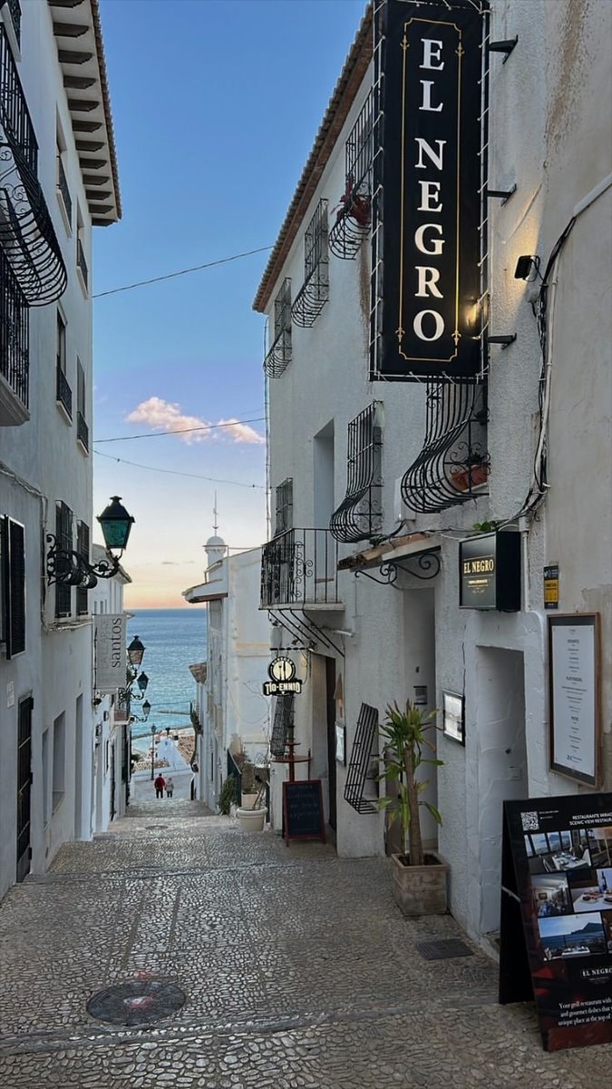 Alicante Italy blue potted plants street (photo 4 of 4)