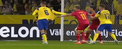 soccer players arguing near goal