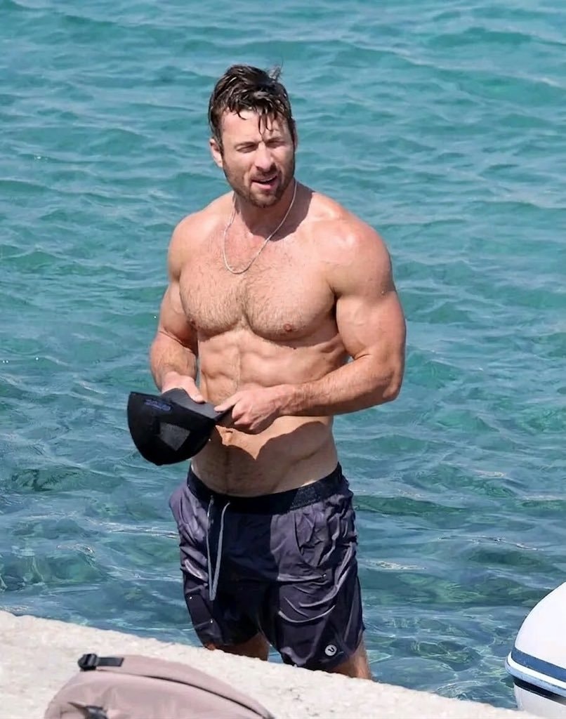 Glen Powell vacation abs (photo 1 of 2)