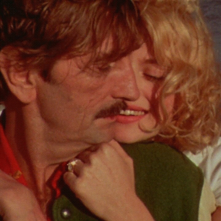 intimate embrace with ring