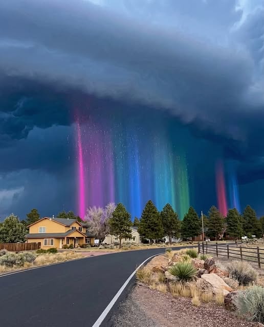 Rainbow rain curtains over high desert storm Rainbow rain curtains over high desert storm